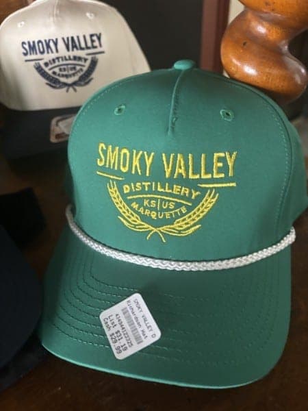 Green rope-front cap with gold Smoky Valley Distillery embroidery