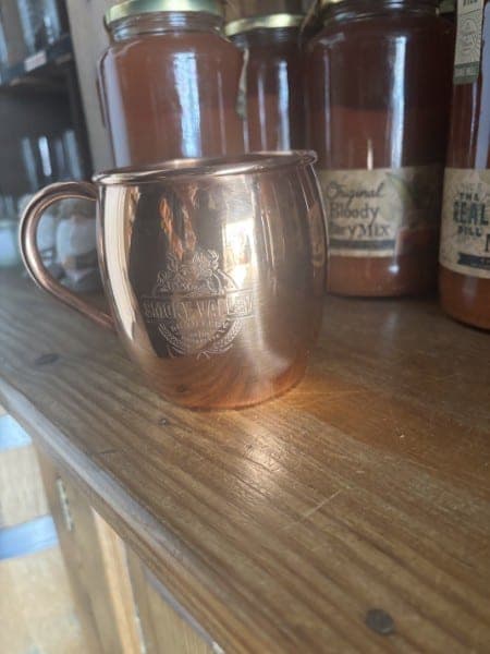 Copper Moscow Mule mug engraved with the Smoky Valley Distillery crest